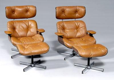 Appraisal: Pair Eames style armchairs ottomans laminated construction with leather cushions