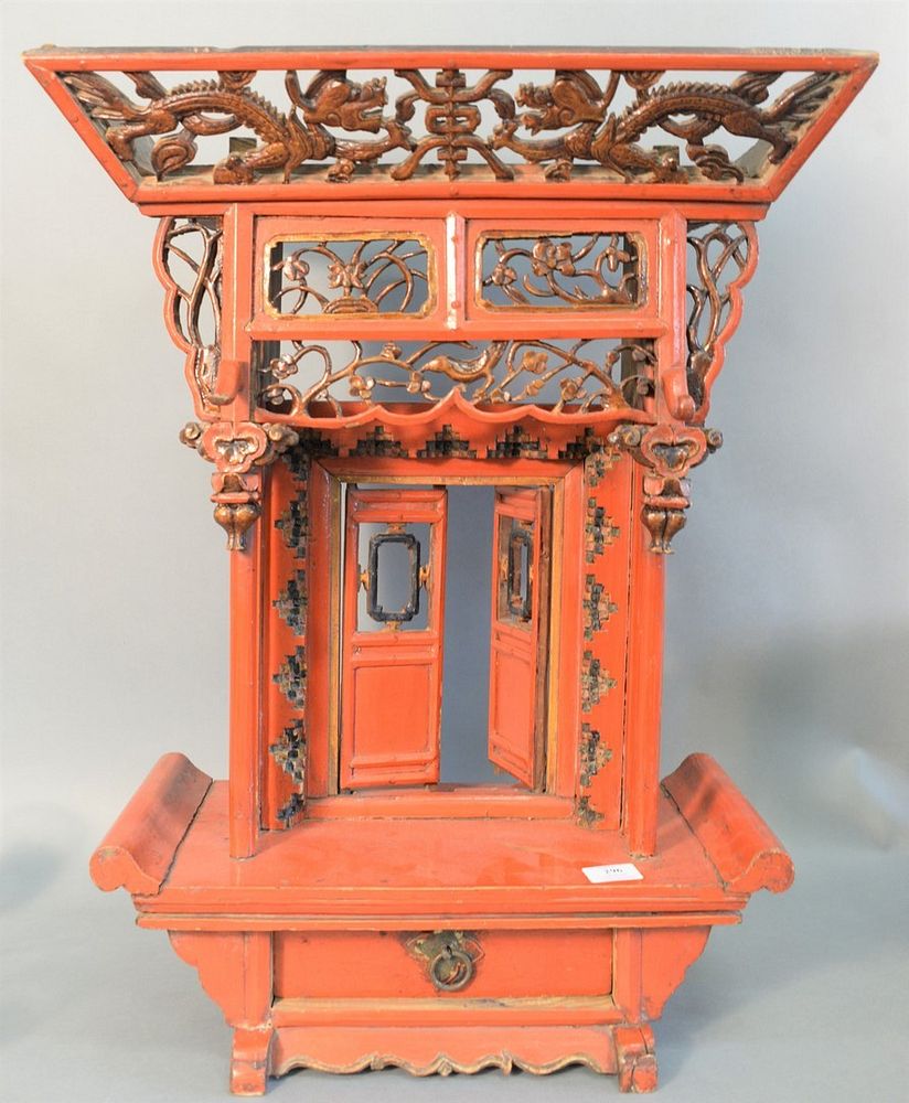 Appraisal: Chinese tabletop shrine red painted with carved dragons ht wd