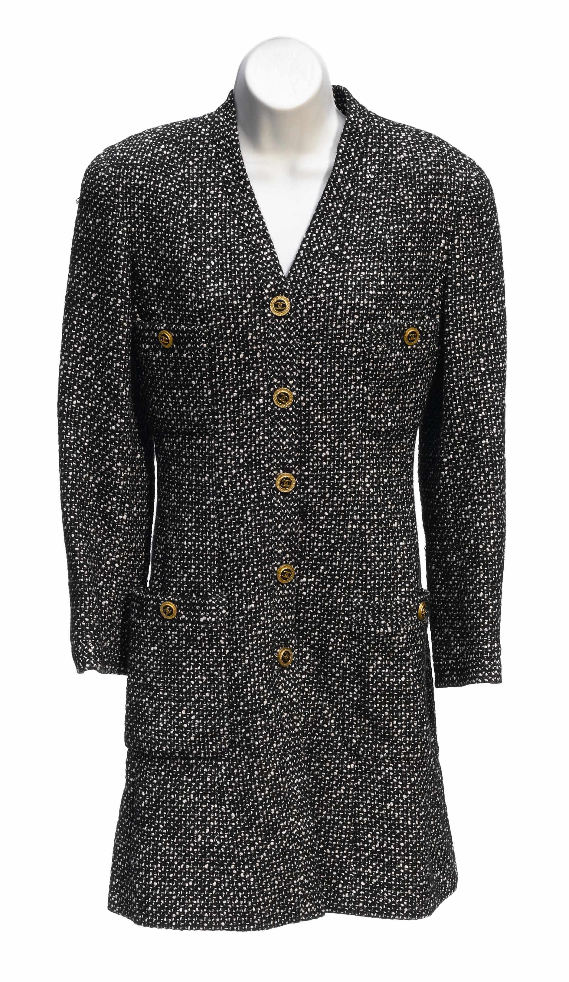 Appraisal: A Chanel black and white tweed coat size together with