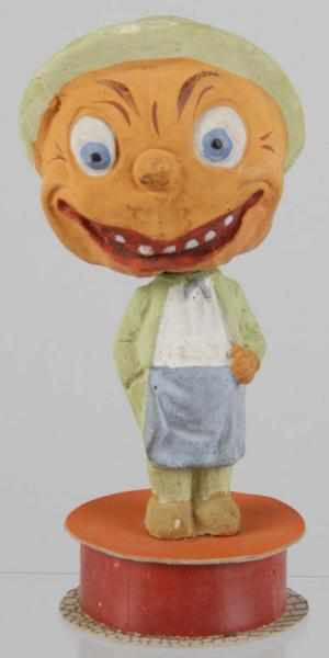 Appraisal: Composition Pumpkin Head Nodder Candy Container Condition Excellent Size -