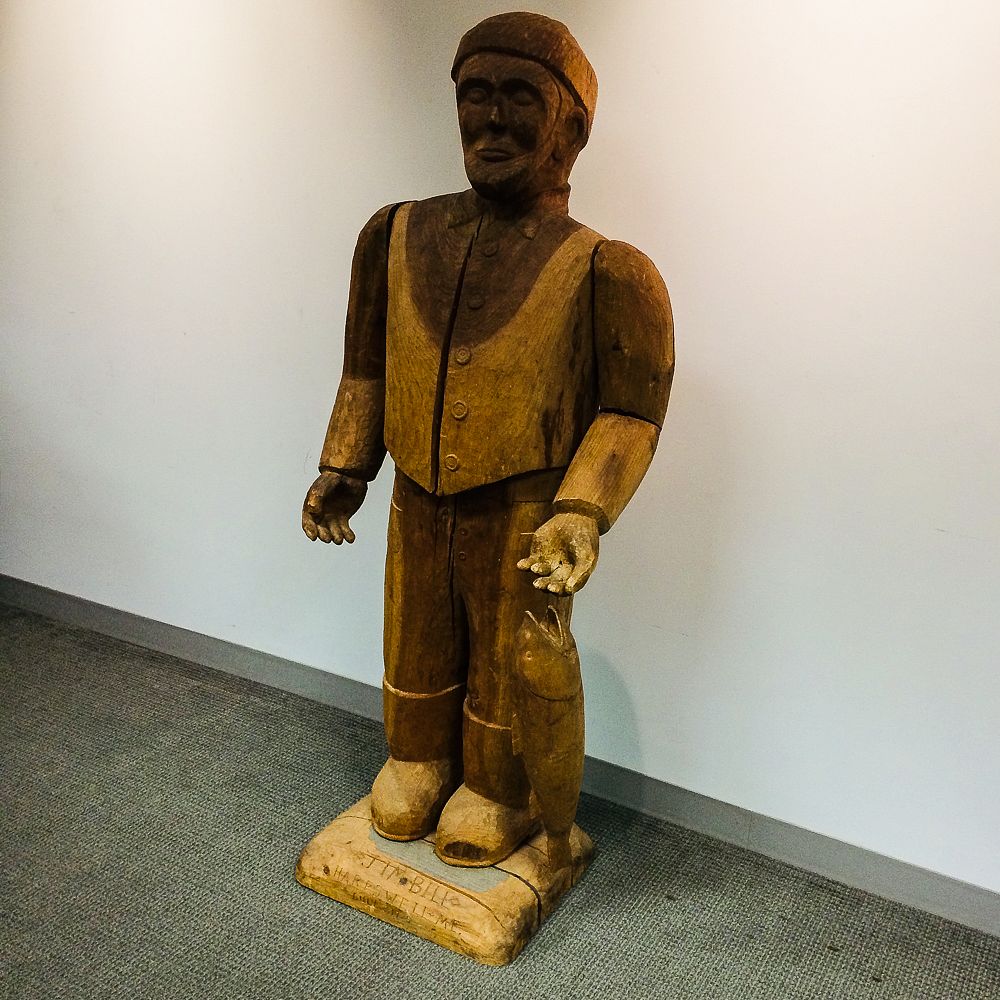 Appraisal: Life-size Carved Pine Fisherman Jim Bill Life-size Carved Pine Fisherman