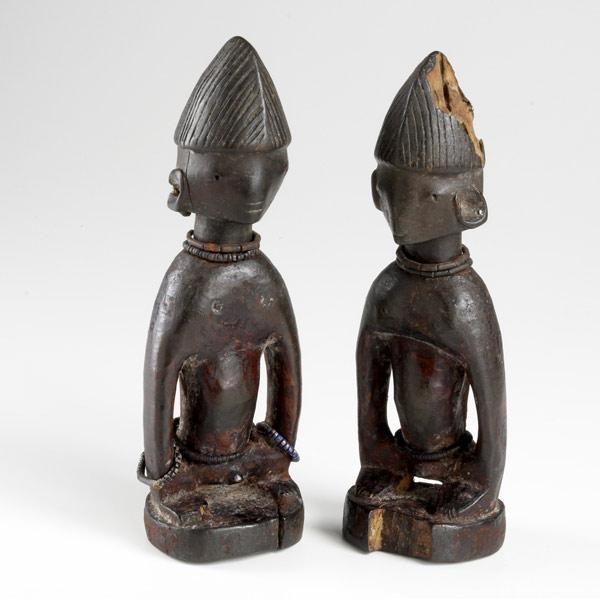 Appraisal: TWO YORUBA MALE IBEJI TWIN FIGURES Nigeria Africa Carved wooden