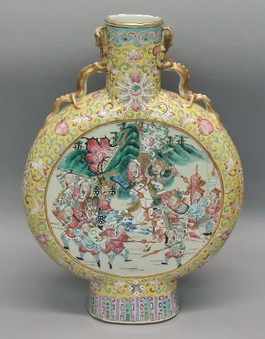 Appraisal: Featuring battle scenes on either side with dragon form handles