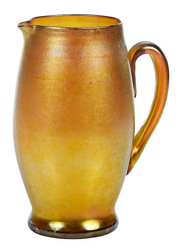 Appraisal: Tiffany Favrile Glass Pitcher American early th century gold iridescent