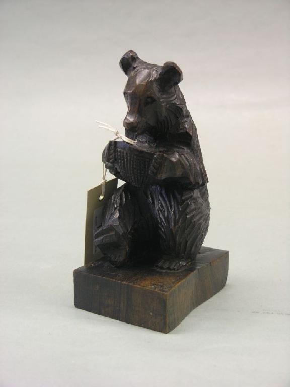 Appraisal: A Swiss carved wood bear late th or early th