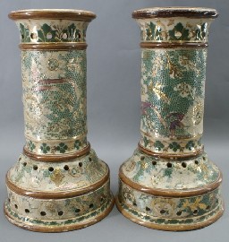 Appraisal: A pair of early Doulton Lambeth stoneware pricket candlesticks each