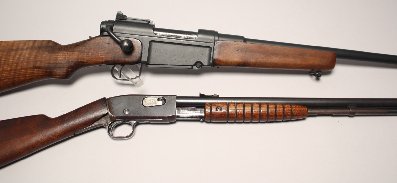 Appraisal: TWO RIFLES Including a Remington slide-action cal serial length of