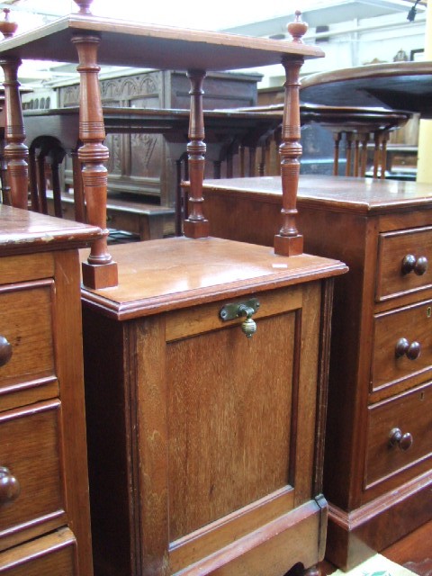 Appraisal: A late th century oak coal purdonium with turned supports