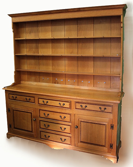 Appraisal: A GEORGE III STYLE LIGHT OAK DRESSER the upper section