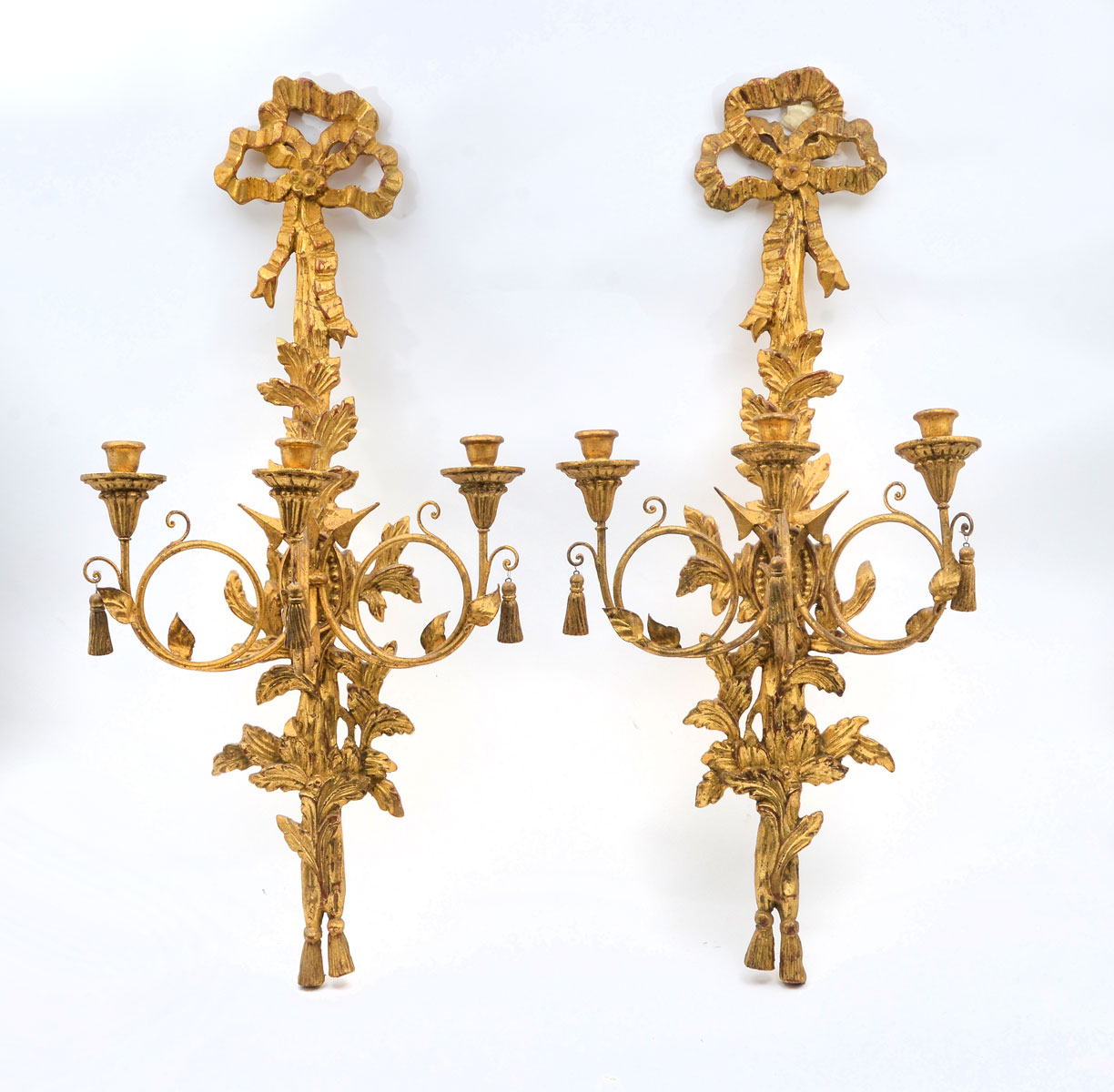 Appraisal: PAIR OF CARVED GILT ITALIAN SCONCES carved gilt Italian candle