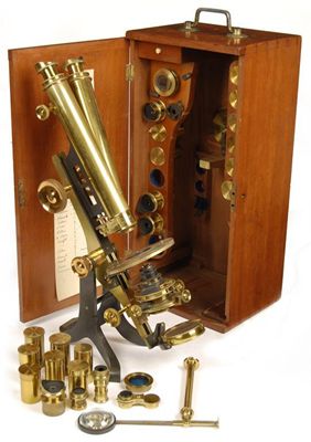 Appraisal: A lacquered brass binocular microscope by C Collins with rack