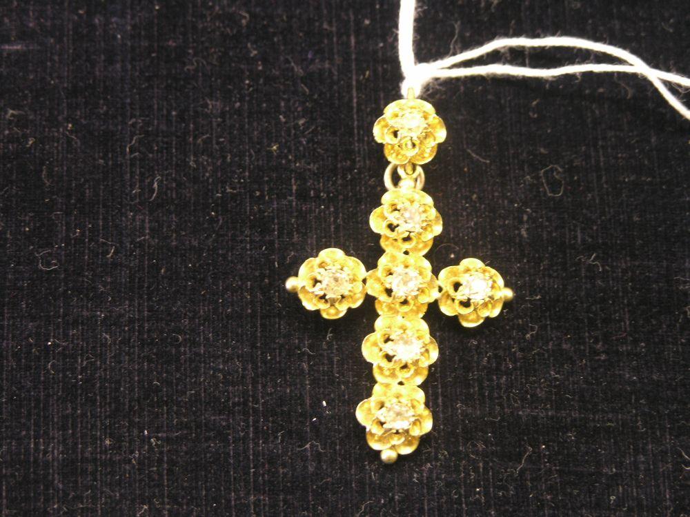 Appraisal: A Victorian gold and diamond cross pendant the cross claw