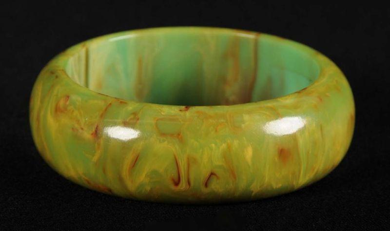 Appraisal: Bakelite Marbleized Thick Bangle Bracelet Description Sea foam green with