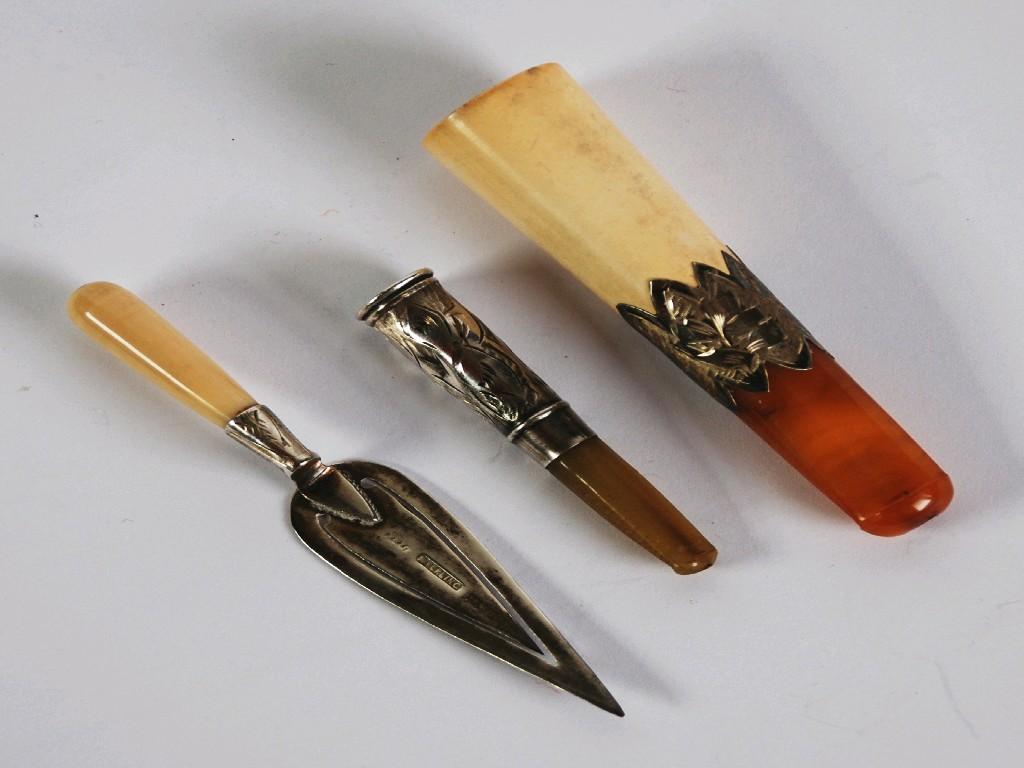 Appraisal: STERLING SILVER BOOK MARK trowel pattern with bone handle Edwardian