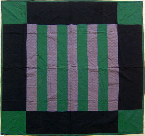 Appraisal: Amish pieced wool quilt in a black tan and green