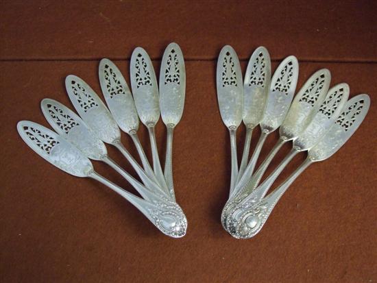 Appraisal: Set of twelve Victorian silver engraved and pierced decoration cake