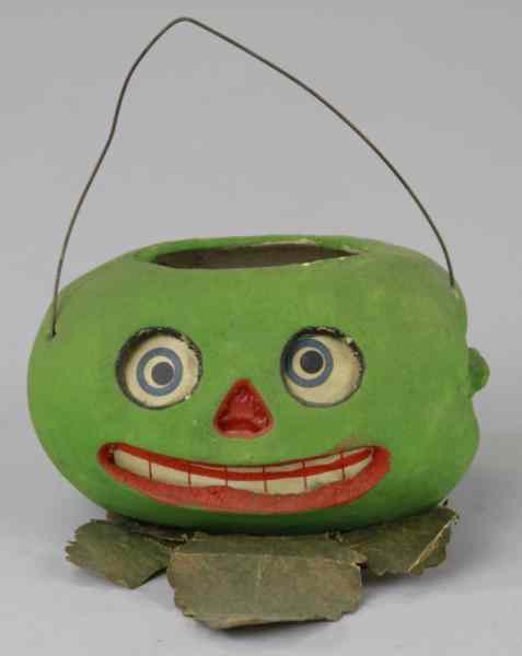 Appraisal: WATERMELON JACK-O-LANTERN CANDY CONTAINER Germany composition container done in colorful