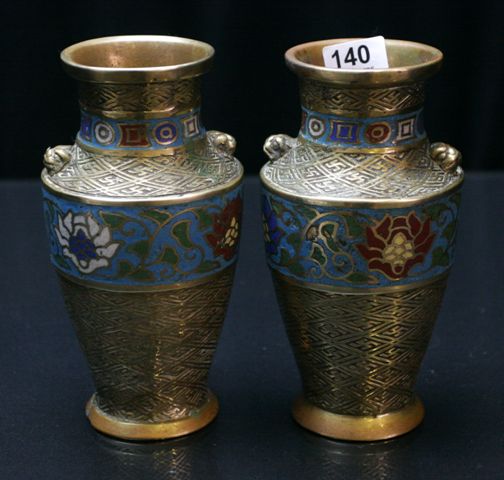 Appraisal: A pair of Japanese vases decorated with bands of cloisonn