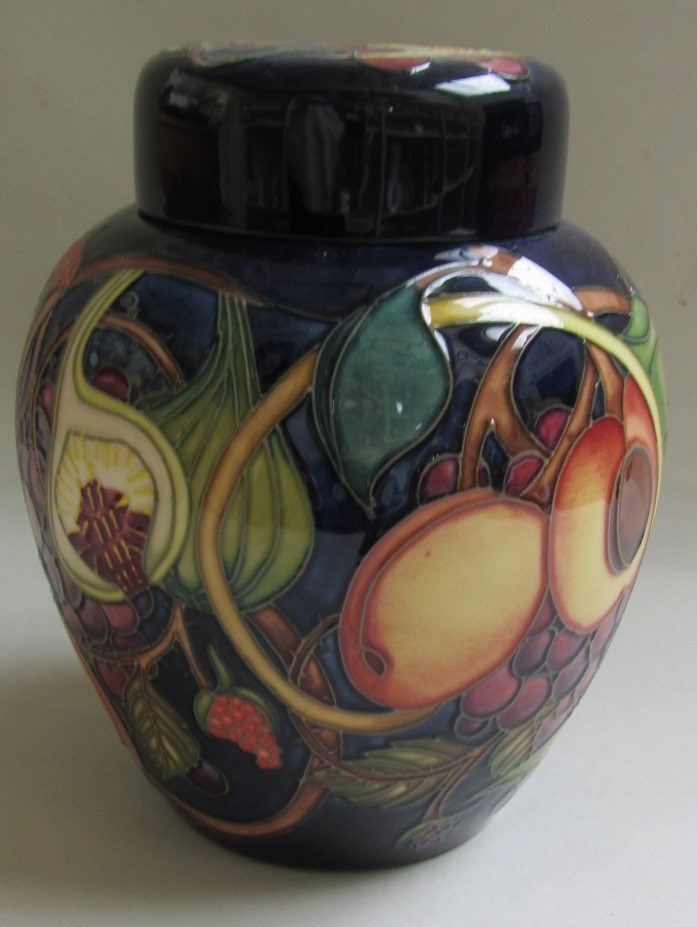 Appraisal: A Moorcroft 'Queen's Choice' pattern ginger jar and cover impressed