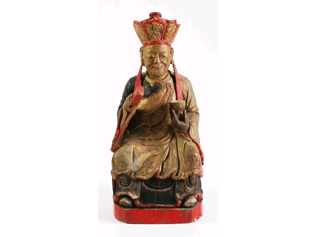 Appraisal: CHINESE CARVED POLYCHROME WOODEN FIGURE OF KUAI HSING modelled seated