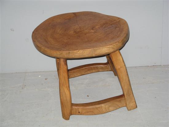 Appraisal: Solid elm stool carved out of a single piece of