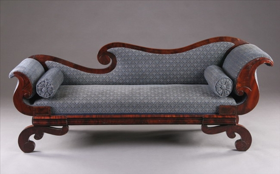 Appraisal: AMERICAN EMPIRE MAHOGANY SOFA early th century Asymetrical scrolled and