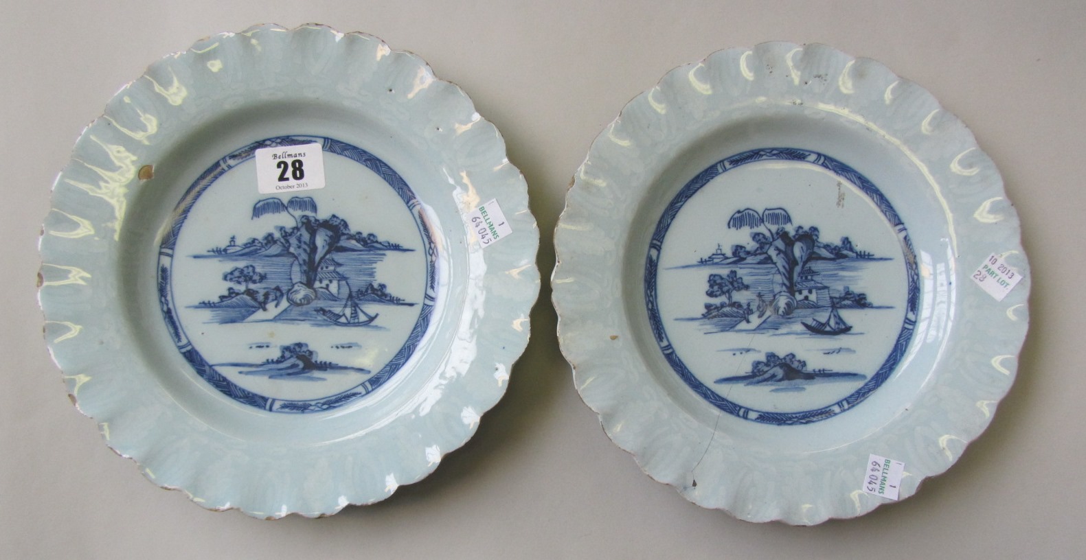 Appraisal: A pair of English delftware blue and white plates probably