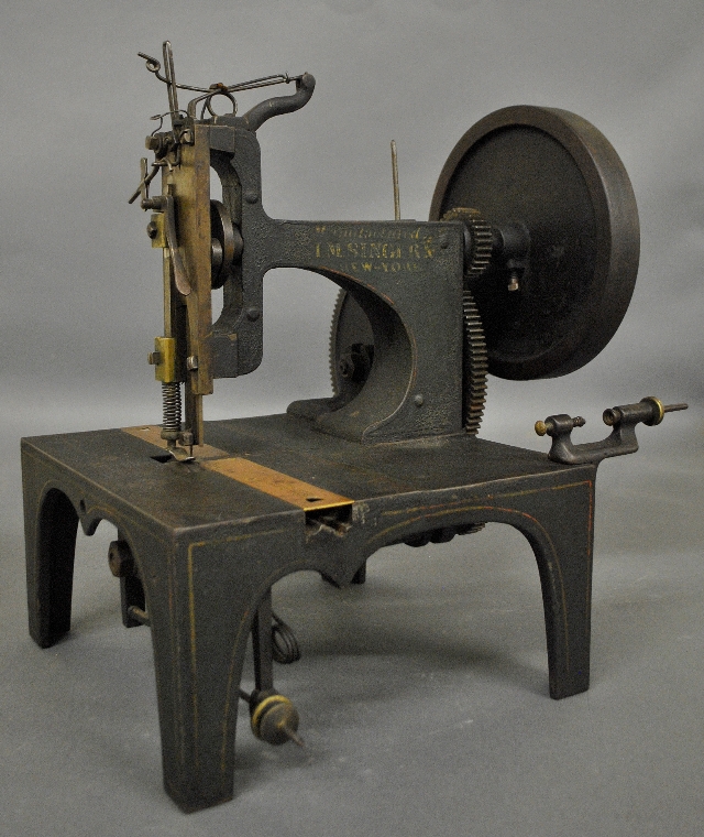 Appraisal: - Cast iron Singer sewing machine with the original paint