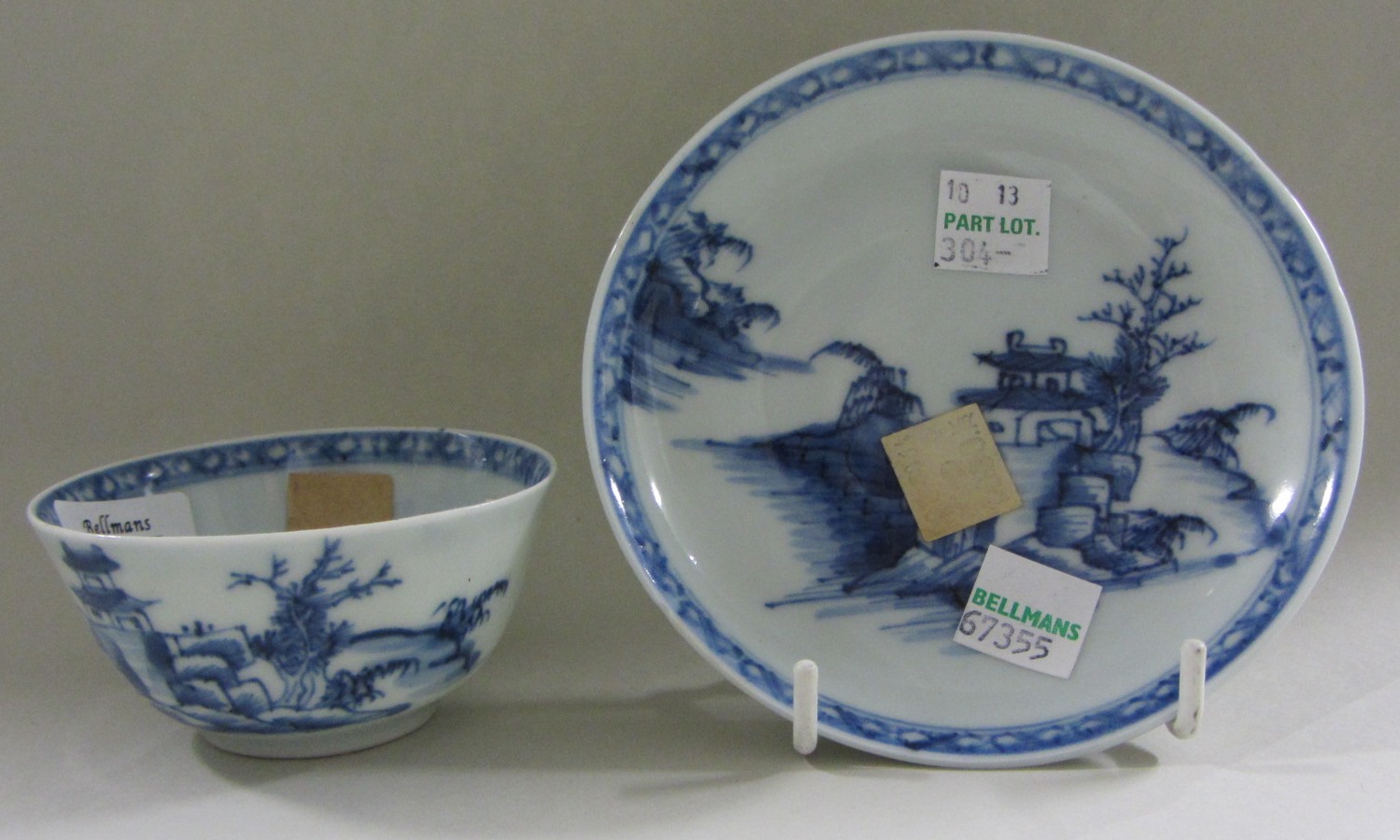 Appraisal: A Chinese Nanking Cargo' teabowl and saucer circa painted with