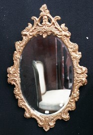 Appraisal: A Rococo style hall mirror