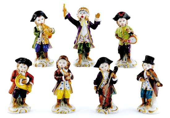 Appraisal: German porcelain monkey band miniature figures in th century costumes