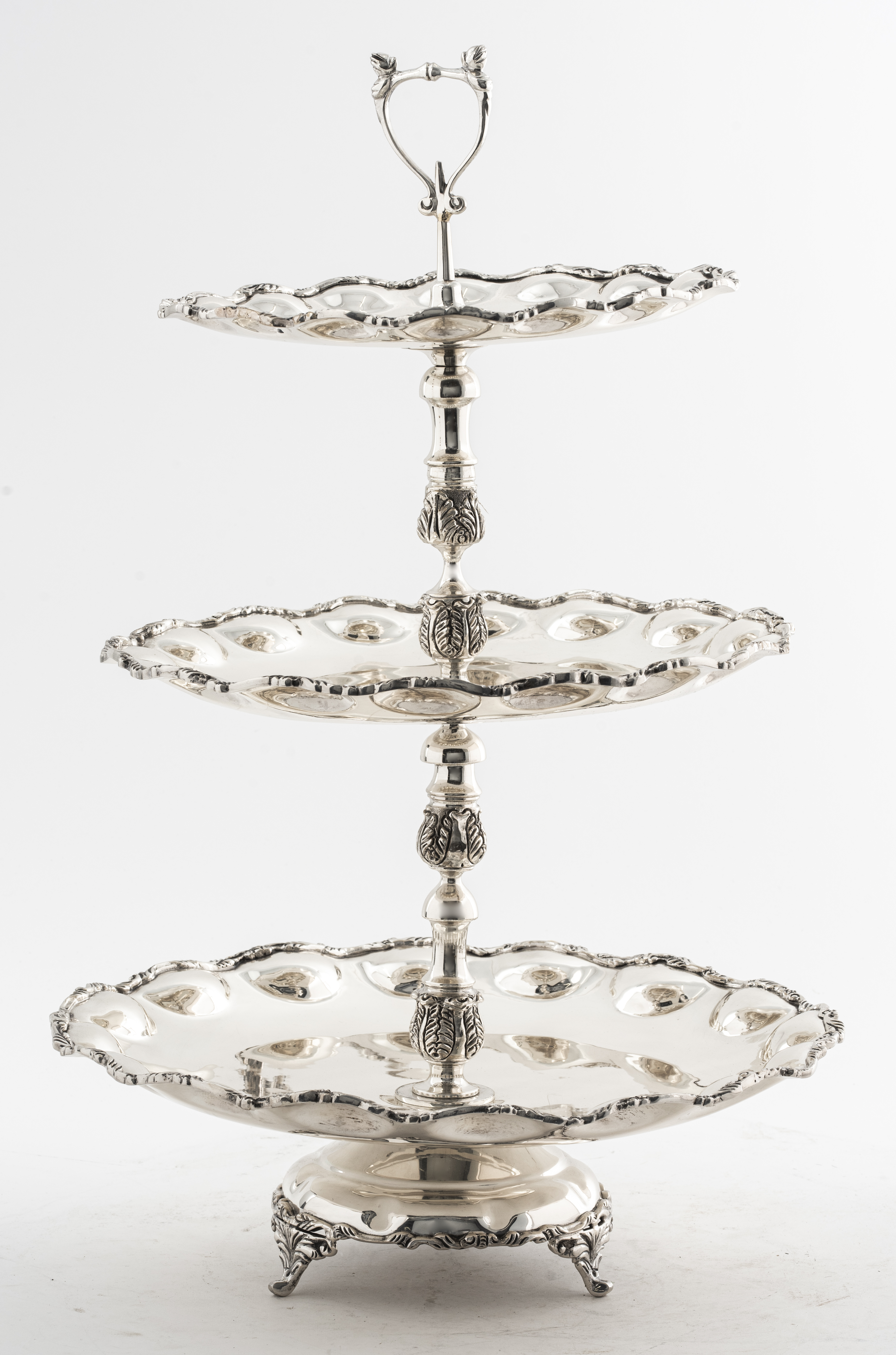 Appraisal: SILVER-PLATE TIERED CAKE STAND Silver-plate cake stand serving tray with