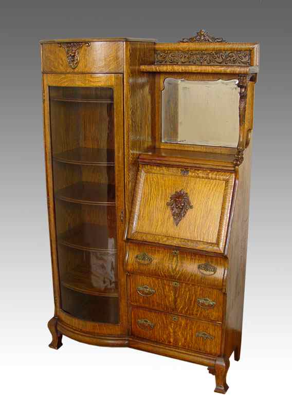 Appraisal: TIGER OAK SIDE BY SIDE SECRETARY BOOKCASE Single curved glass