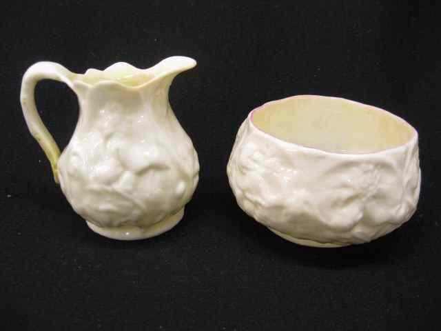 Appraisal: Irish Belleek Porcelain Creamer Sugar raised floral decor old black