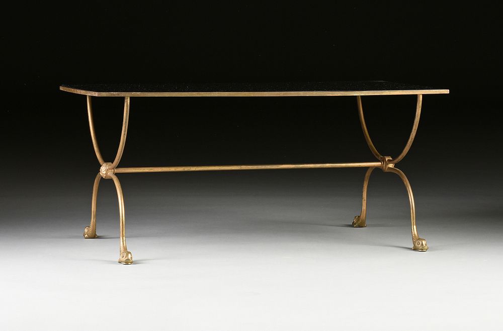 Appraisal: A MAISON JANSEN BLACK GLASS TOPPED BRASS COFFEE TABLE POSSIBLY