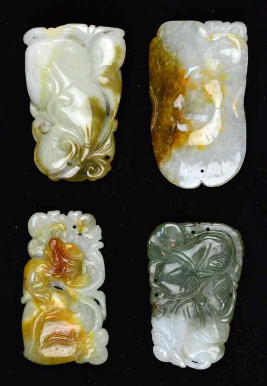 Appraisal: Chinese Qing Carved Jade PendantsFinely carved to depict fish and