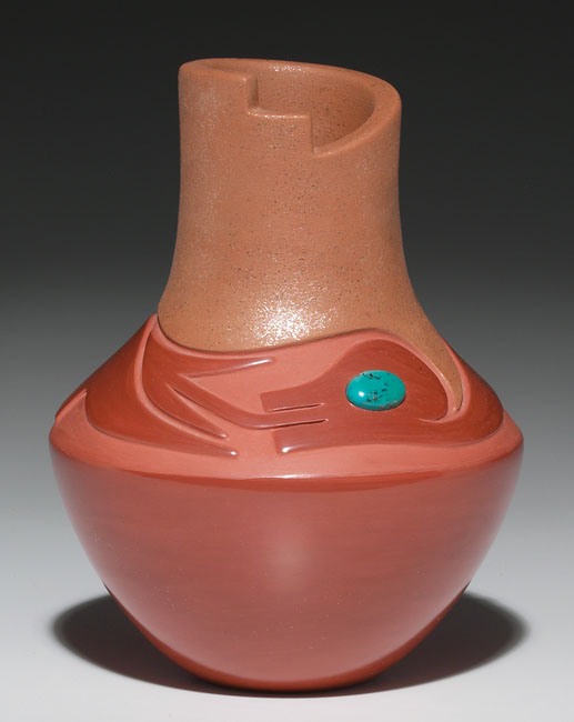 Appraisal: San Ildefonso vase unusual shape with a carved avanyu design