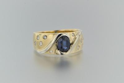 Appraisal: A Contemporary Design Sapphire and Diamond Ring k yellow gold