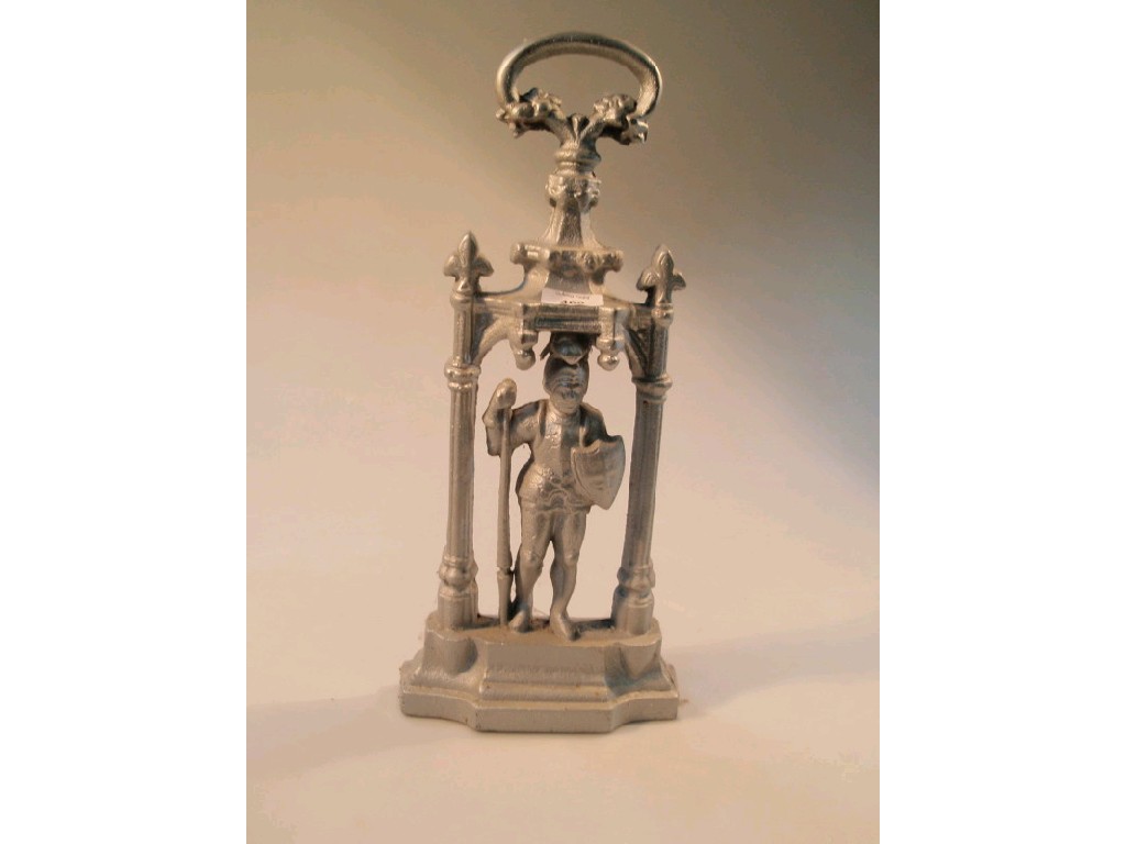 Appraisal: A cast iron doorstop in the form of a knight