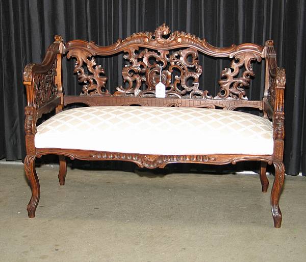 Appraisal: An Austrian Rococo style walnut settee last quarter of th