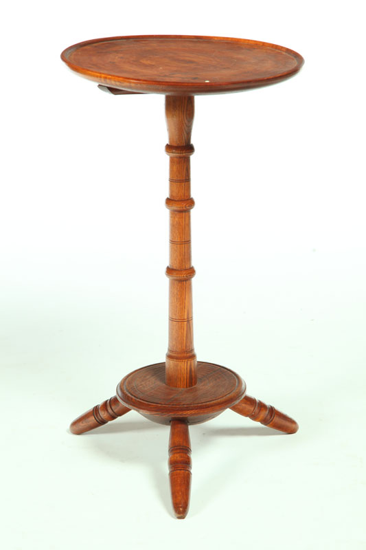 Appraisal: WINDSOR CANDLESTAND American early th century maple and ash Dish