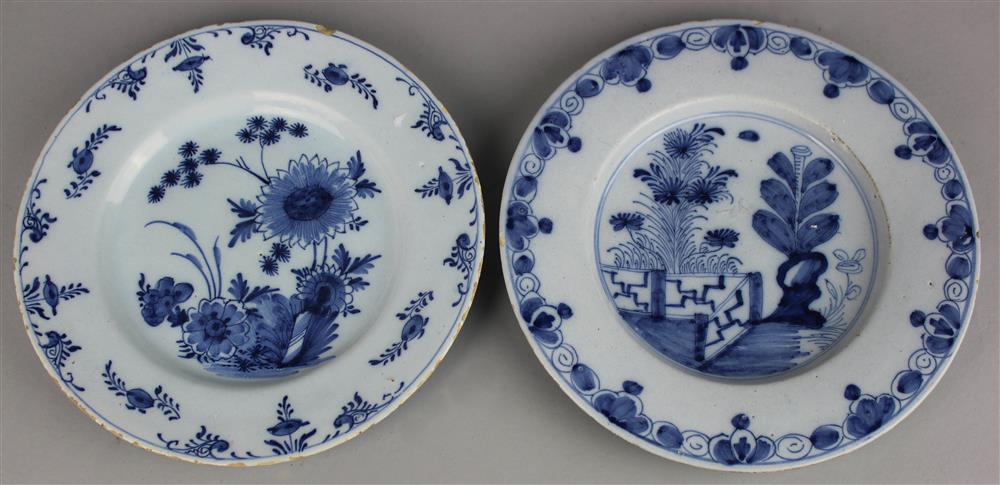 Appraisal: TWO DELFT PLATES the first with a central floral spray