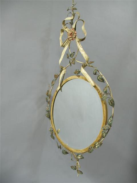 Appraisal: LA BARGE TOLE PAINTED MIRROR Formed as an oval mirror