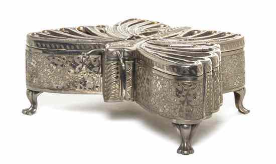 Appraisal: A Silvered Metal Music Box in the form of a