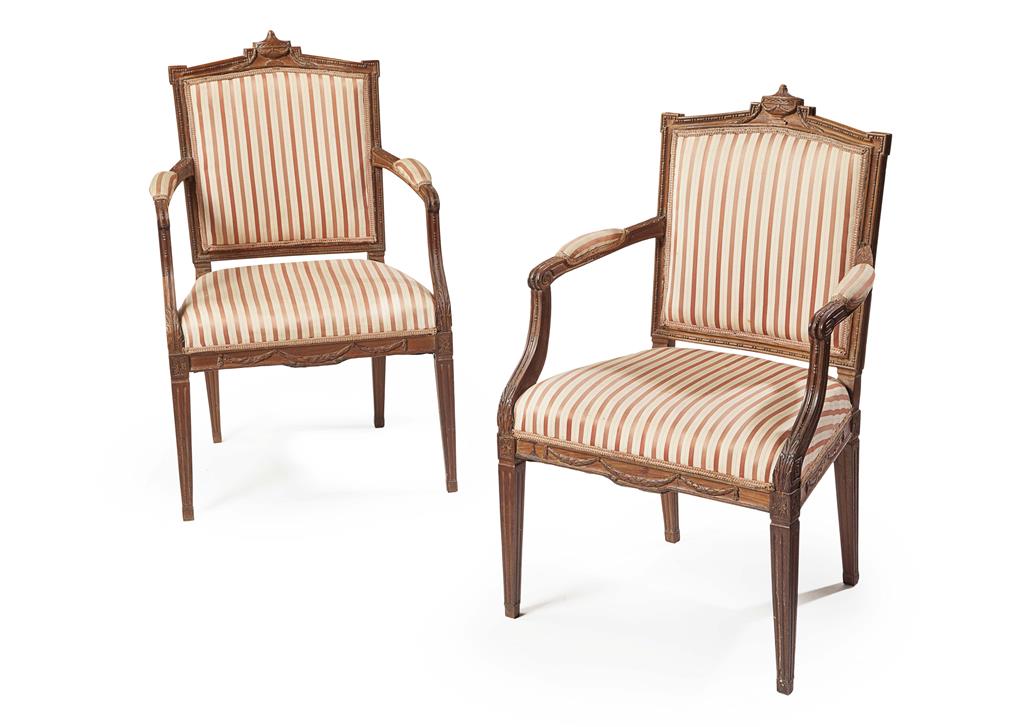 Appraisal: PAIR OF FRENCH WALNUT FRAMED FAUTEUILS TH CENTURY of Louis