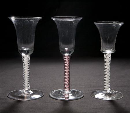 Appraisal: Three air twist drinking glasses th century each with bell