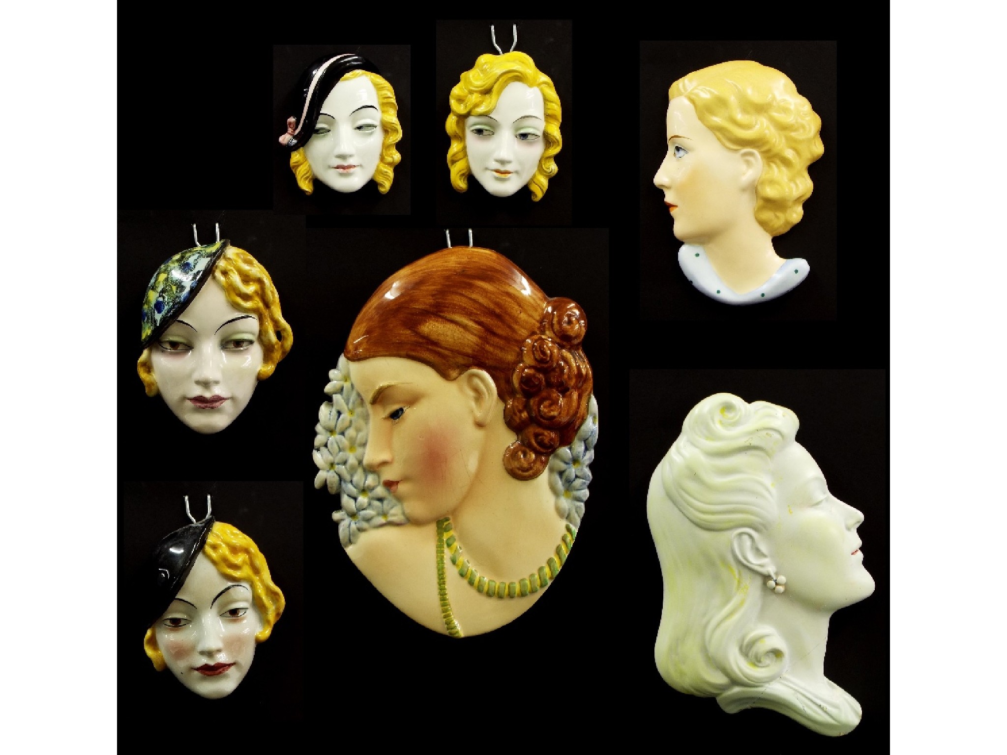 Appraisal: Beswick porcelain wall hanging mask of a girl amidst foliage