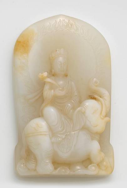 Appraisal: A jade carving of Guanyin Carved in high relief depicting