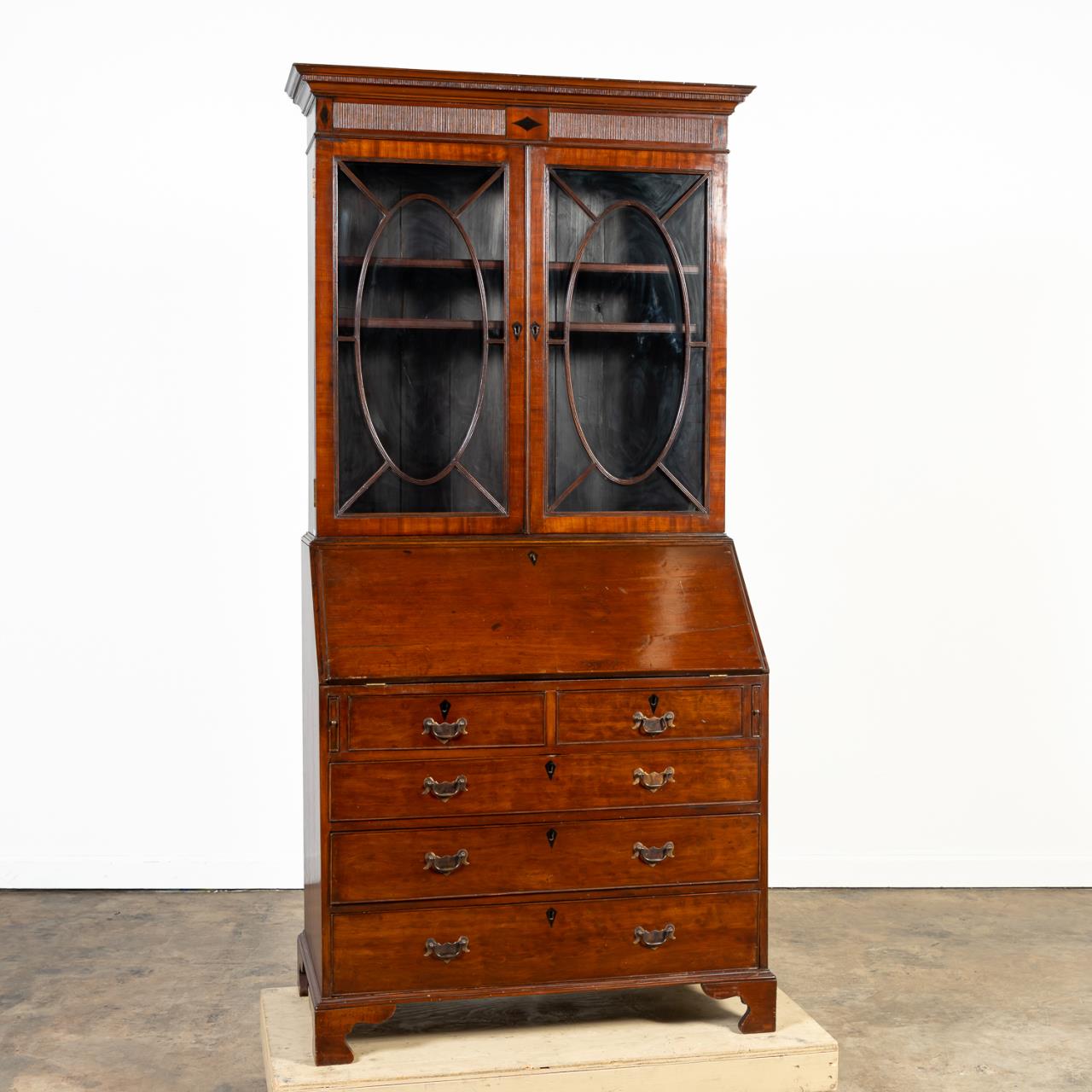 Appraisal: GEORGIAN-STYLE MAHOGANY BUREAU BOOKCASE English mahogany and mahogany veneered bureau