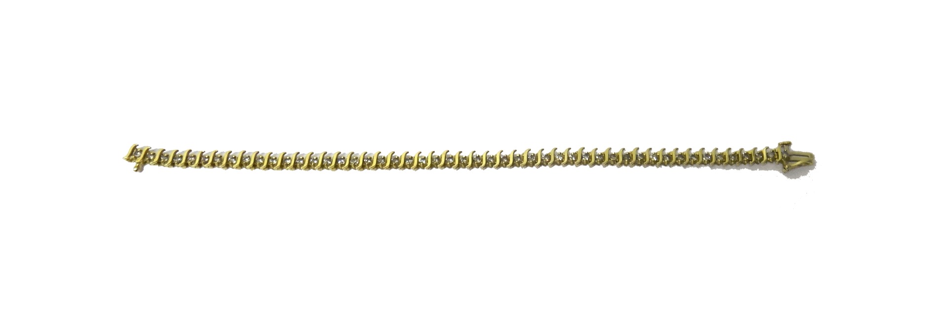 Appraisal: A gold and diamond set line bracelet claw set with